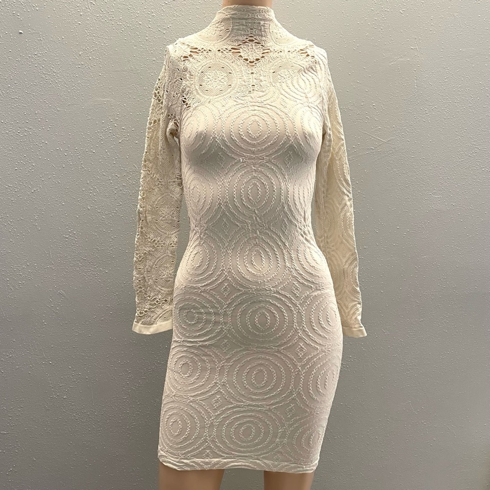 Bebe style long sleeve Bodycon with laser cut detailing and turtleneck